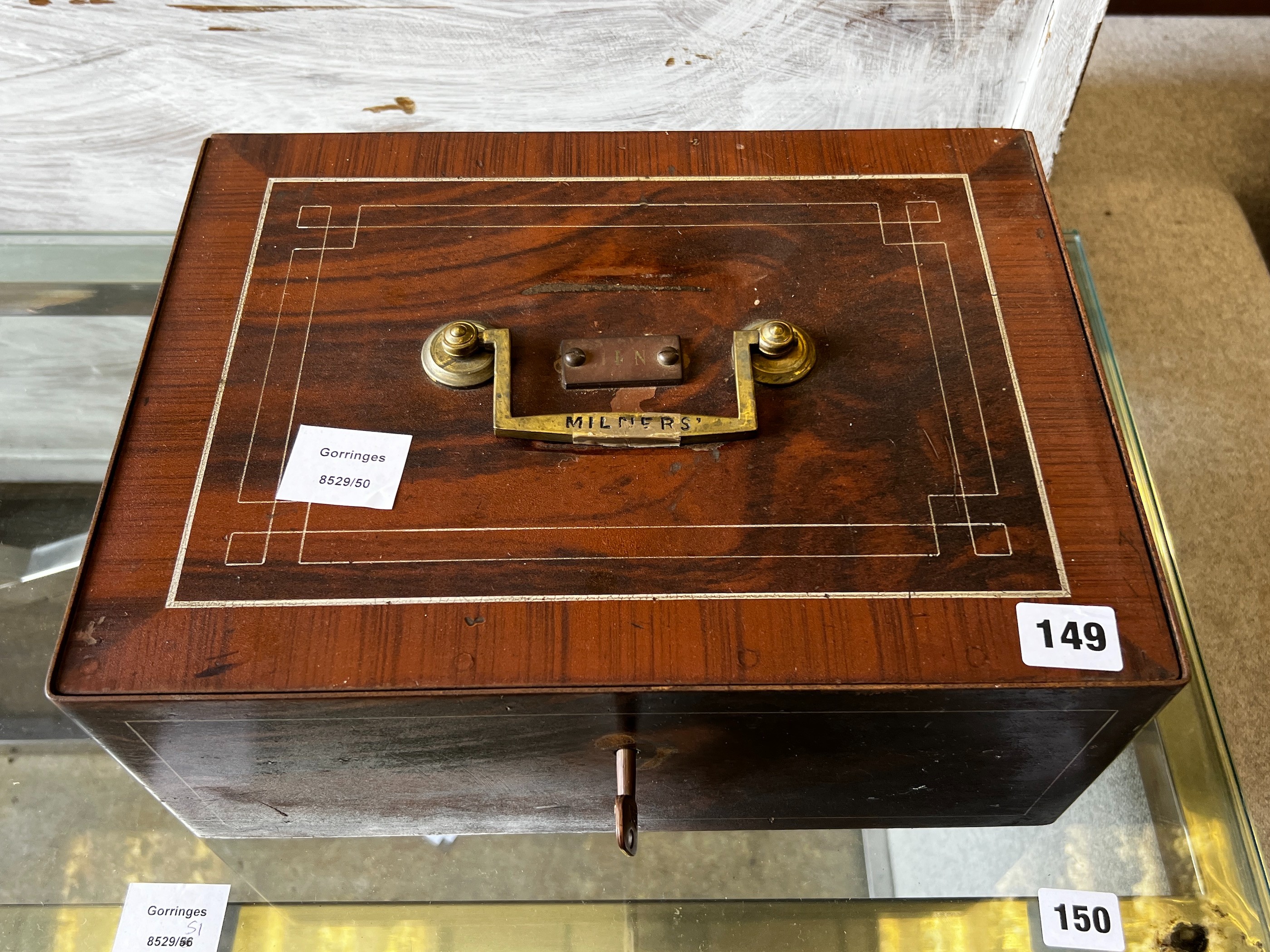 A milner's strong box with painted simulated grain, width 35cm, depth 26cm, height 14cm